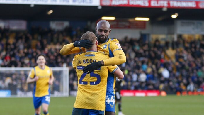 Ghanaian midfielder Hiram Boateng scores for Mansfield Town against Salford City