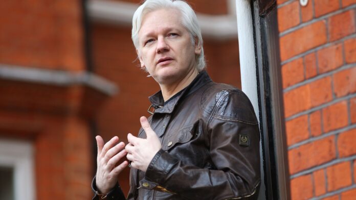 Who is Julian Assange and where is he now?