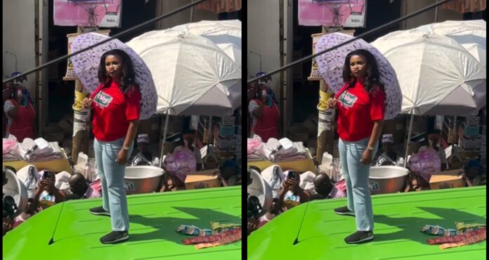 VIDEO: Nana Ama McBrown steals the spotlight at Makola market as she dances on top of a ‘trotro’