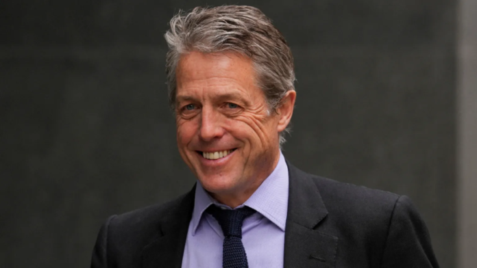 Hugh Grant settles privacy case against Sun publisher 
Hugh Grant settles privacy case against Sun publisher