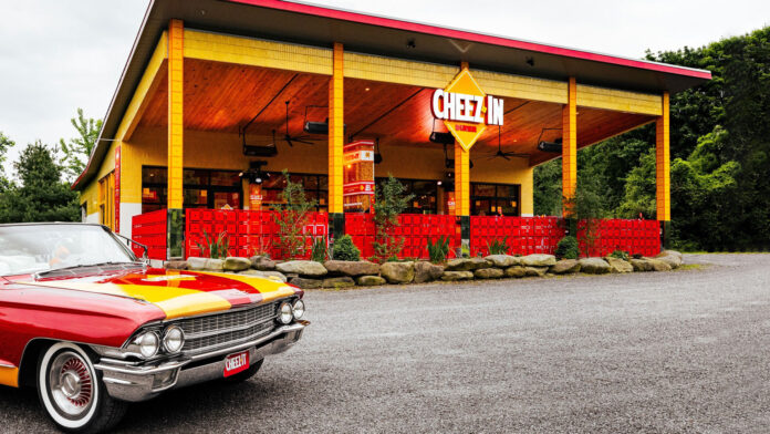 Where is the Cheez-In Diner and what’s on the menu?