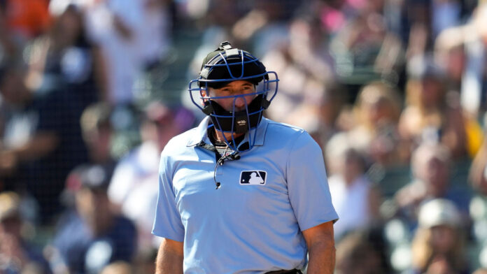 Why did MLB umpire Angel Hernandez retire and what has he said about his career?