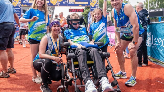 Last photo of rugby hero Rob Burrow shows him smiling with family at MND fundraiser just weeks before his death aged 41