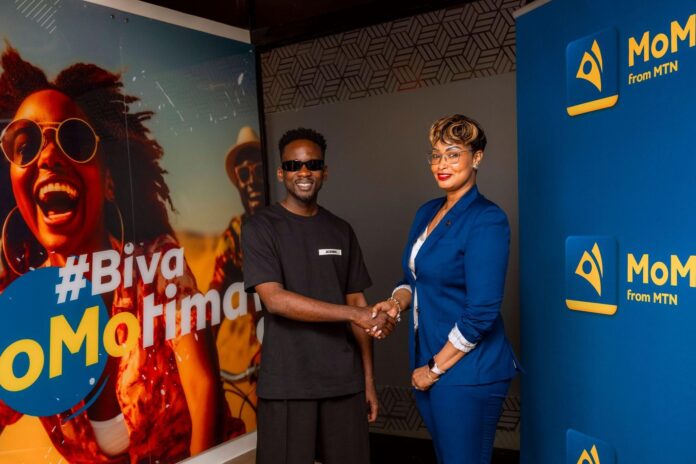 Mr Eazi and Chantal Kagame (CEO, MTN Mobile Money Rwanda)