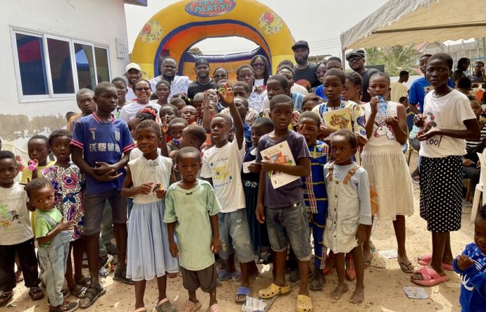 Philip Nai and friends spend time with kids of Agblezaa 
Philip Nai and friends spend time with kids of Agblezaa on Christmas eve