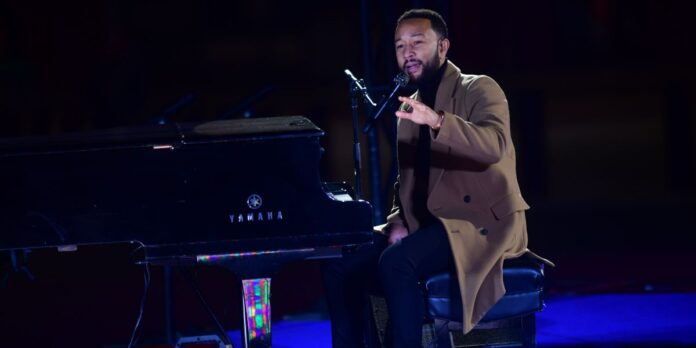 
US star John Legend defends playing Rwanda concert during war                            